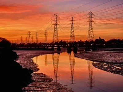 Reconducting Existing Transmission Lines Enables Low-Cost Grid Decarbonization